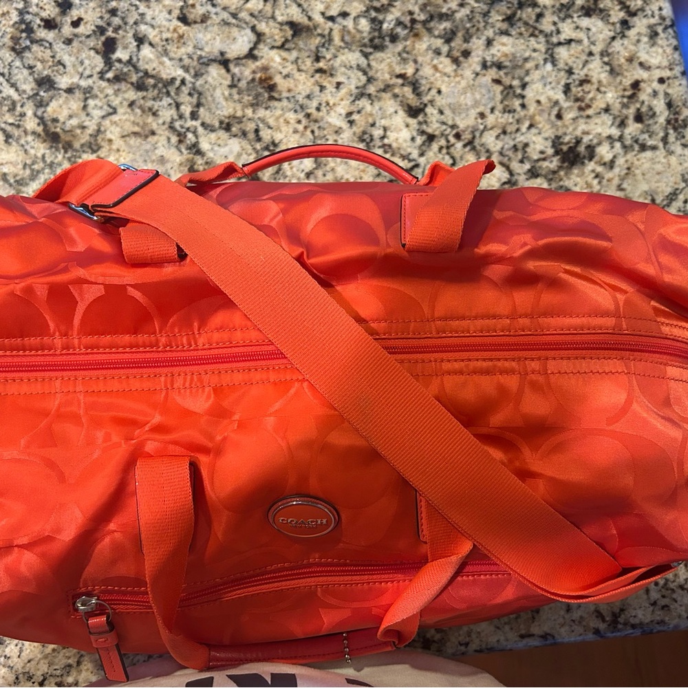 Coach Orange Duffel Bag